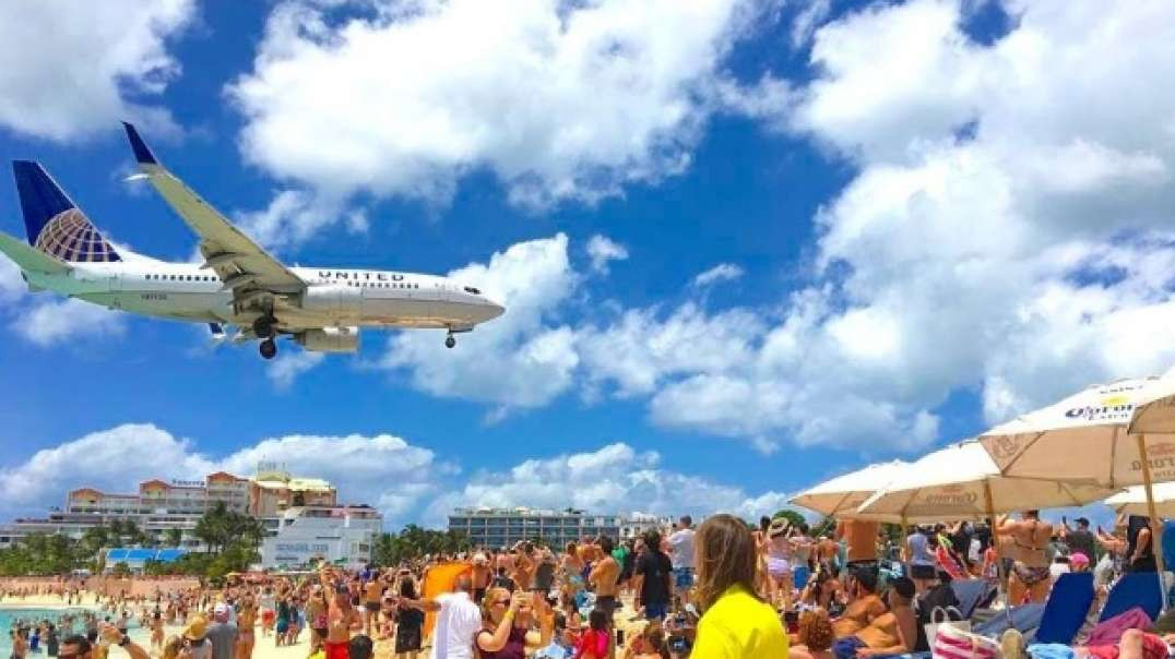 AVIÕES PASSAM RASANTES NA AREIA EM ST. MARTIN